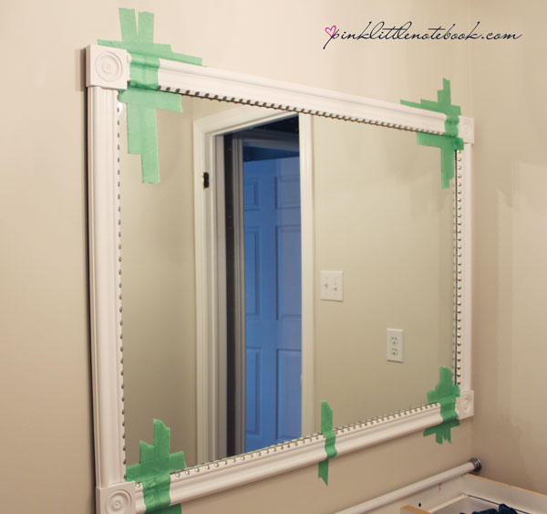 How To Frame Out That Builder S Grade Mirror The Easy Way Pink Little Notebookpink Notebook - How To Make A Diy Mirror Frame With Moulding
